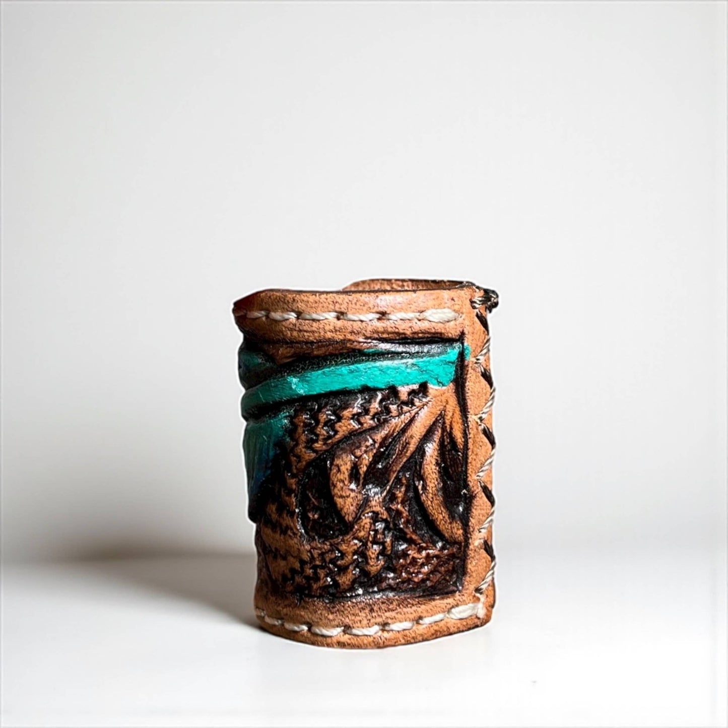 Feather tooled leather scarf slide 